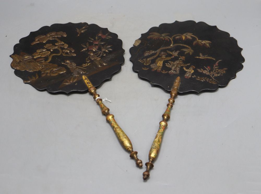 A pair of Japanese lacquered face screens, length 42cm